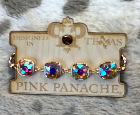 A close up of the back of a pink panache bracelet