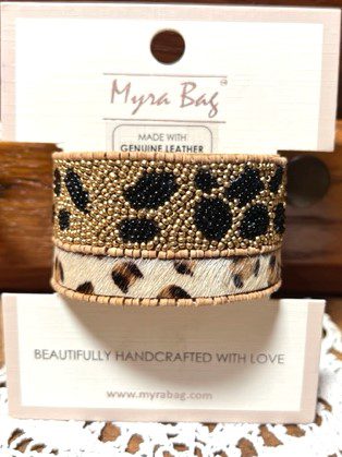A pair of bracelets with animal print and black beads.