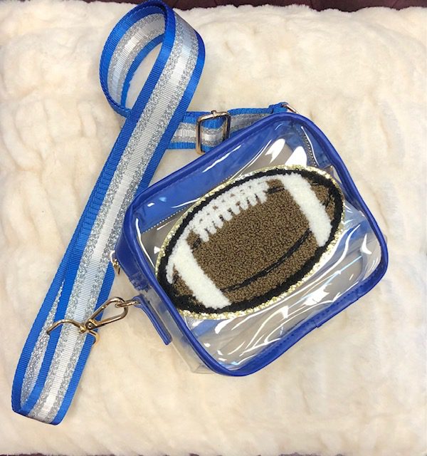 A ROYAL BLUE FOOTBALL CLEAR GAME DAY BAG with an embroidered football on it.