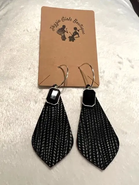 A pair of BLACK WITH BLACK STONE JAZZIE EARRINGS on a white background.